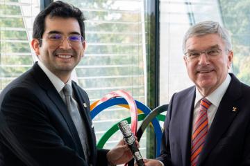 Presidente del COI sostuvo importante reunión con Renzo Manyari en Suiza
